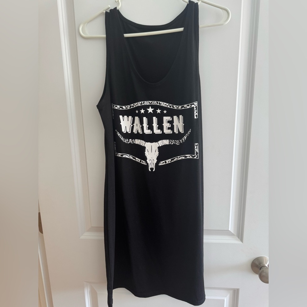 Black Sleeveless Wallen Dress with a cropped black graphic T Shirt. - Small